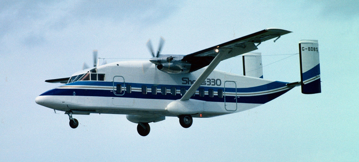 Striped SD330 aircraft in flight