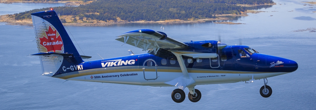 Twin Otter Series 400 flying over ocean