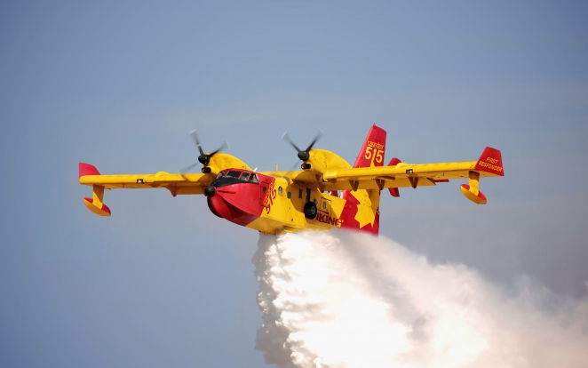 Viking Canadair CL-515 Aerial Firefighter & Multi-Role Amphibian CL-515 Aerial Firefighter dropping a load of water